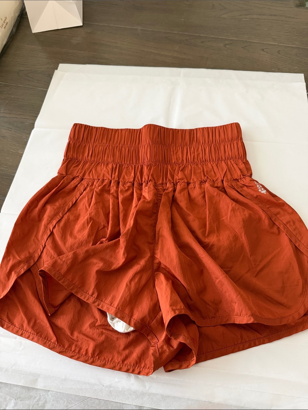 FP Movement by Free People High-Waist Athletic Shorts in Rust Orange